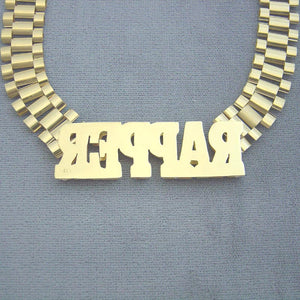 Backside and side profile view of the 3D iced-out nameplate attached to the 12mm watch-band link chain.