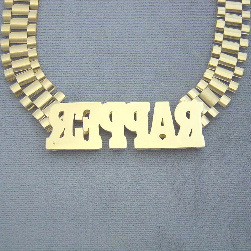 Backside and side profile view of the 3D iced-out nameplate attached to the 12mm watch-band link chain.