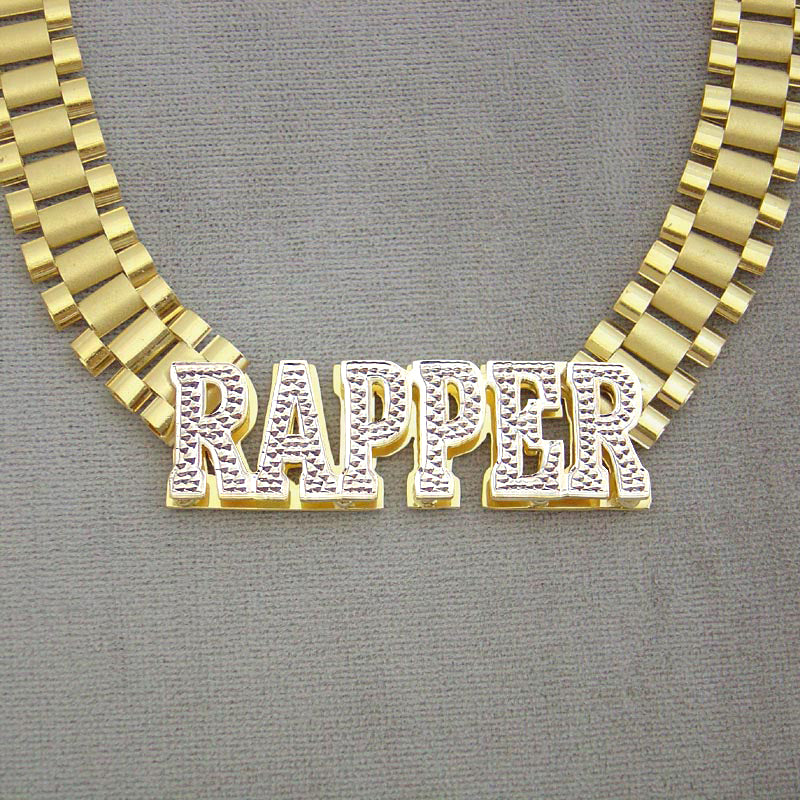 Front angle view of the 10K yellow gold watch-band link chain with "RAPPER" iced-out nameplate displayed on a dark backdrop.