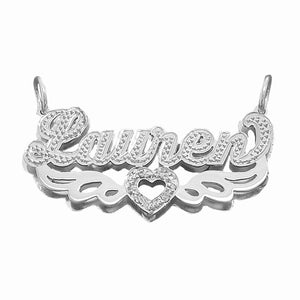 Custom 3D sterling silver "Lauren" nameplate pendant featuring diamond-cut accents, angel wings, and a central heart symbol.
