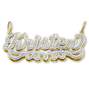 Custom 3D double plate solid gold iced out name pendant in Kristen script font with rhodium accents.