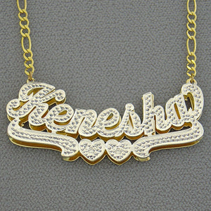 Close-up front view of customized iced out double plate name pendant in yellow gold