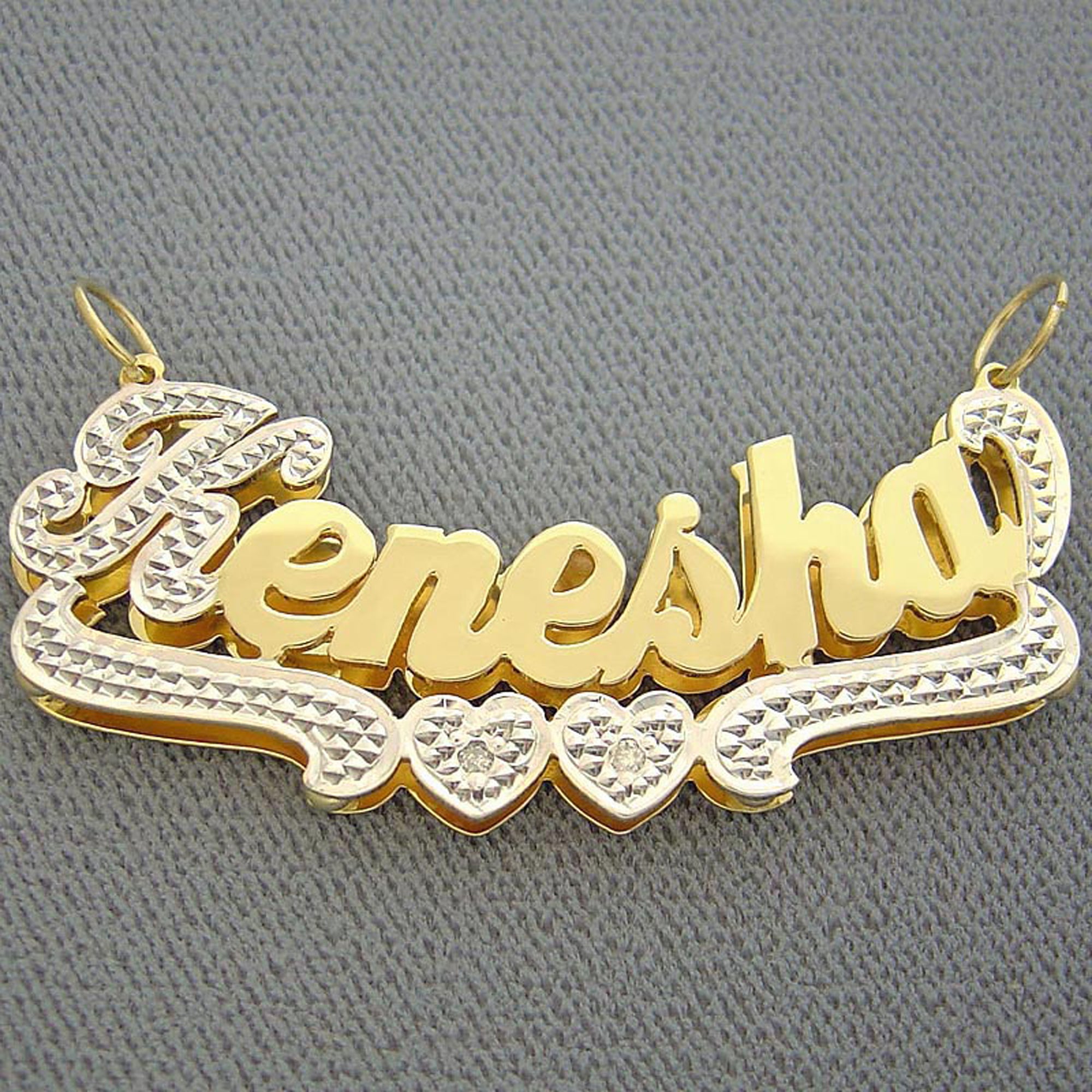 Personalized 2-tone solid gold 3D name charm ND19 worn on a gold Cuban chain