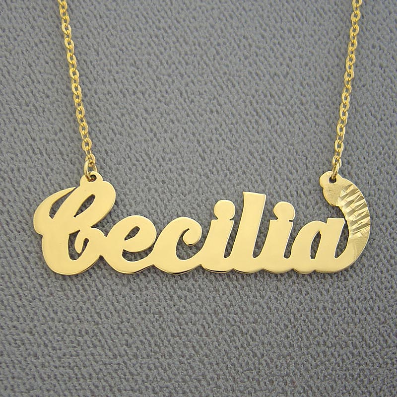 Solid gold personalized cursive name necklace featuring the custom name Cecilia in classic Carrie Bradshaw style script font.