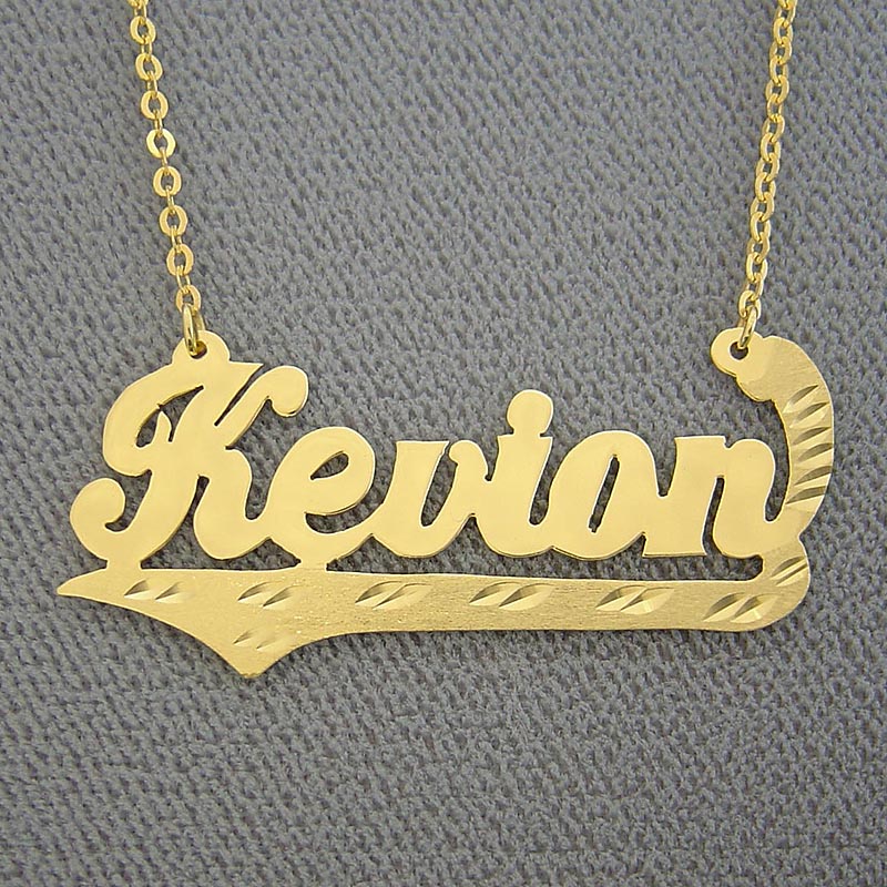 Custom solid gold nameplate pendant in gold featuring cursive lettering and a matching chain.