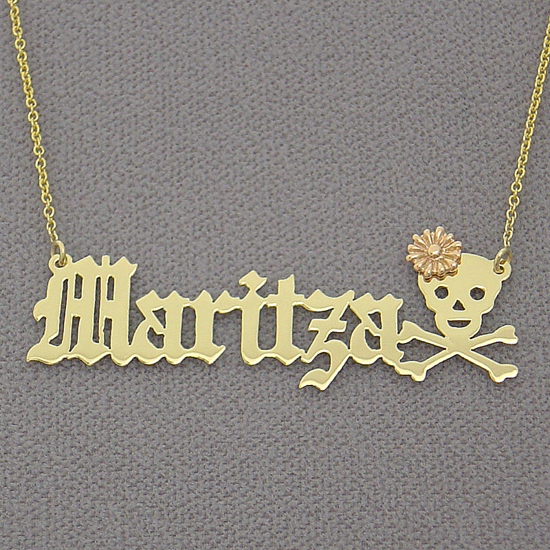 Custom 10k solid gold Old English nameplate necklace spelling 'Maritza' with a skull and rose flower accent.