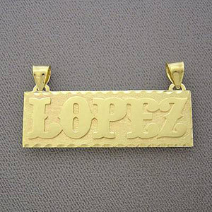 Custom 10k yellow gold rectangular nameplate pendant with diamond-cut border spelling LOPEZ.