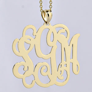 14k solid gold 3-initial monogram pendant with a polished finish.