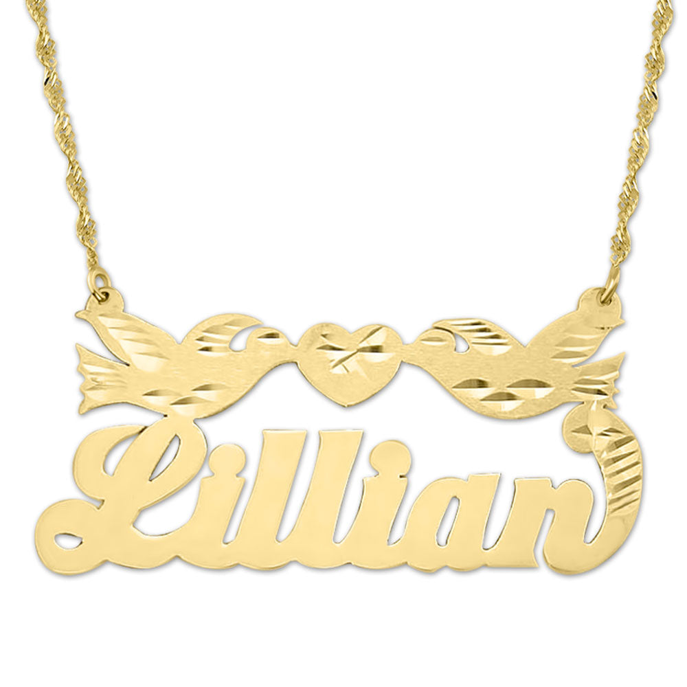 Solid 10k or 14k yellow gold personalized nameplate necklace featuring the name "Lillian" in script font with two kissing birds and a diamond-cut heart motif on a gold chain.