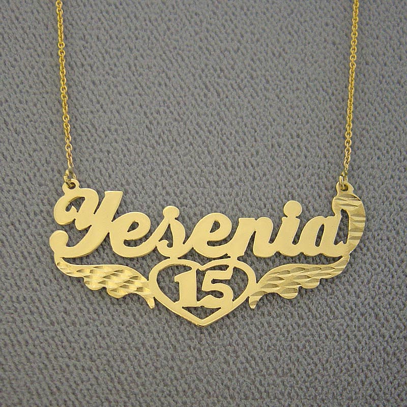 Custom 14K solid yellow gold Quinceañera Sweet 15 name necklace spelling "Yesenia" with angel wings and heart detail.