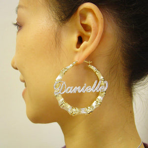 2.25 inch personalized iced out gold bamboo hoop earrings on model
