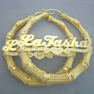 Pair of personalized 10K and 14K gold bamboo hoop earrings with cursive nameplate and heart accent