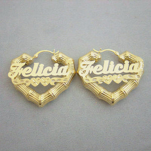 Pair of custom 10k or 14k gold heart bamboo hoop earrings featuring cursive name plates reading Felicia with double center hearts