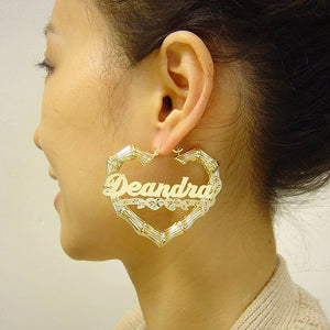 Model wearing 2.4 inch personalized gold heart bamboo nameplate hoop earrings