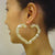 Large 10K Yellow Real Gold Puffy Heart Bamboo Hoop Earrings 3 Inches Wide.