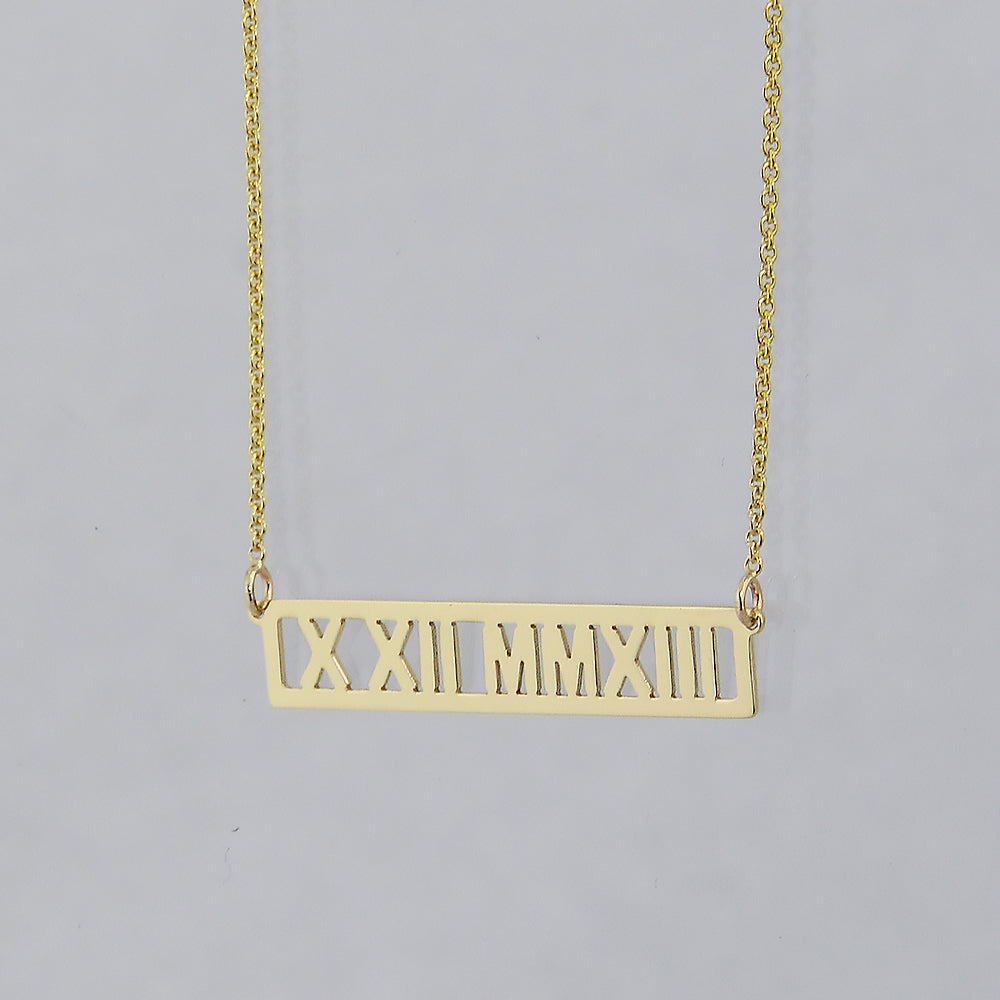 Solid 14k yellow gold horizontal bar necklace with custom Roman numeral date engraving