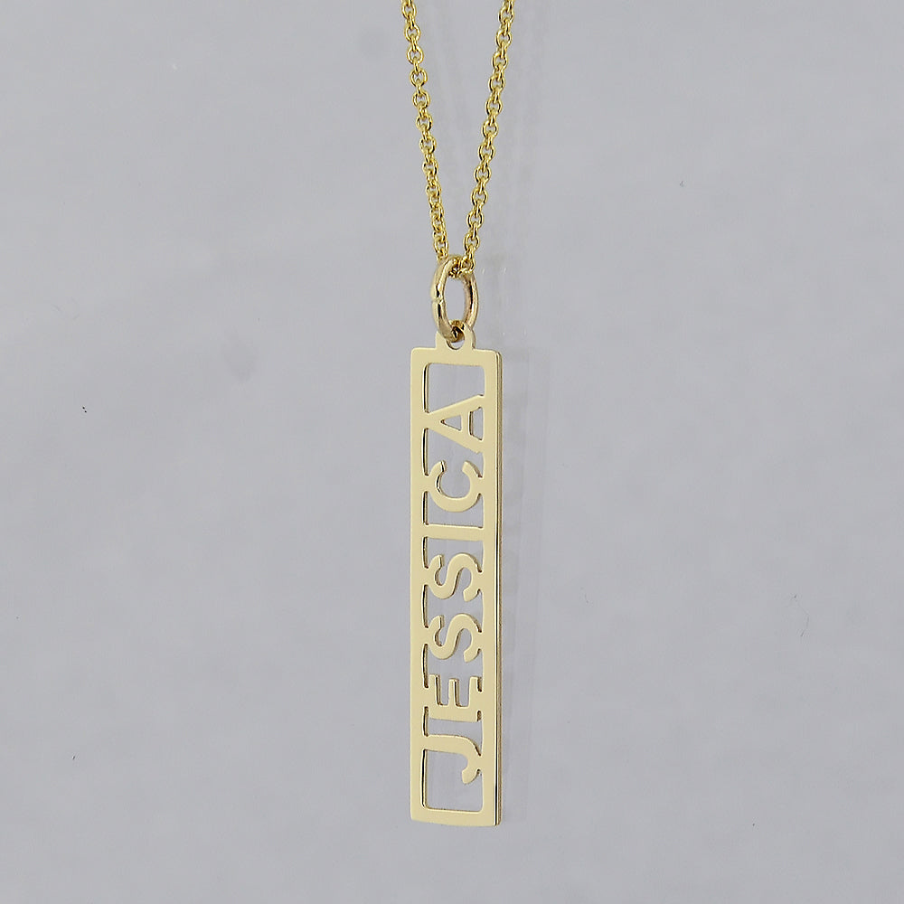 Solid 10k yellow gold vertical bar pendant engraved with custom name Jessica