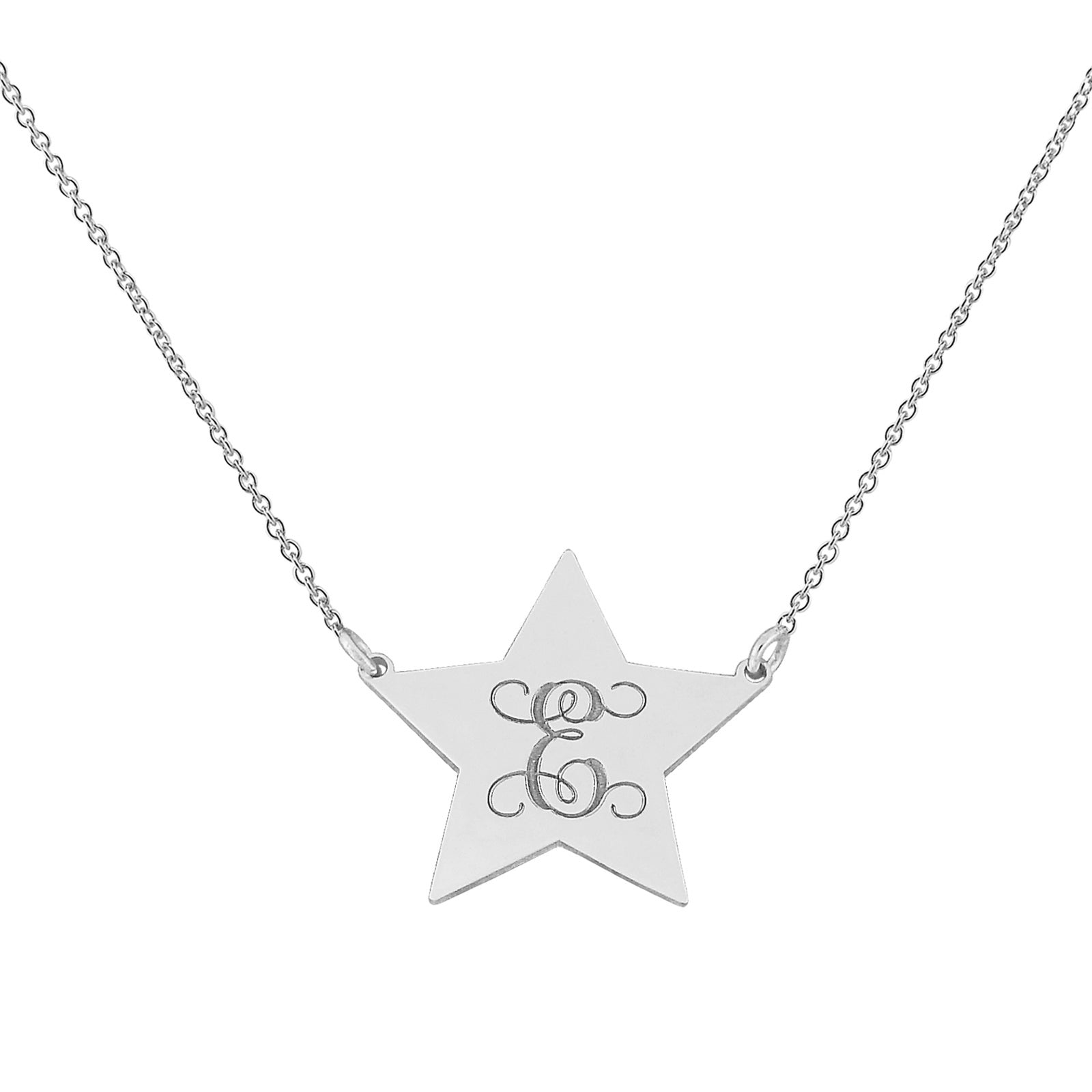 A silver star-shaped pendant necklace with a cursive monogram design in white gold