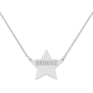 Close-up of deep laser-engraved name on solid 10K white gold star charm penda
