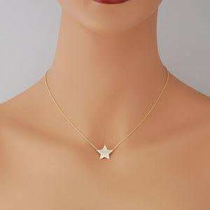 mannequin wearing custom solid gold star pendant necklace with laser