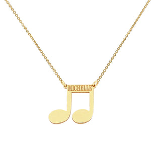 Custom solid 14k gold music note name necklace engraved with the name Michelle