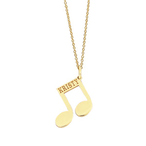 Personalized solid gold music note pendant engraved with custom name KRISTY