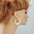 10k Real Gold XO Hearts Puffy Diamond Cuts Hollow Earrings 1.9 Inches Wide.