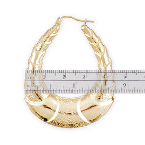 Hinged snap closure on 10k gold shrimp door knocker oval hoop earrings