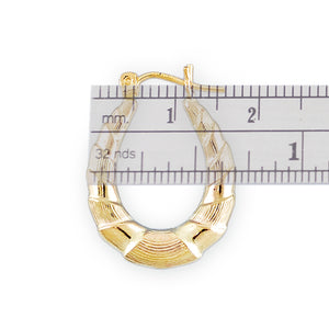 Baby size 10k gold oval shrimp door knocker earrings with ruler measuring 11/16 inch width