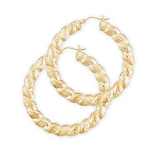 A pair of 10k gold twisted round diamond cut door knocker hollow hoop earrings with a 2-inch diameter.