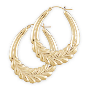 A pair of large 10k gold wheat hollow door knocker hoop earrings, approximately 1.5 inches wide, with a textured leaf-like design.