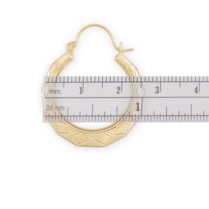 Side profile showing hinged hoop snap closure on 10K gold doorknocker drop earrings