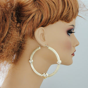 wearing 3 inch extra large 10k gold puffy heart door knocker hoop earrings