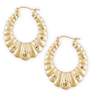 A pair of gold-colored hoop earrings with a textured, diamond-cut pattern.