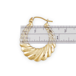 Side view of small 10k gold hollow shrimp door knocker earring