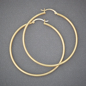 Pair of 14K yellow gold hollow tube hoop earrings 2 inch diameter