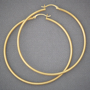 14k yellow gold 60mm hollow hoop earrings with high polish finish