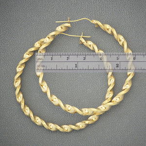 10k gold twisted hoop earrings measured at 2 3/8 inch 60mm diameter