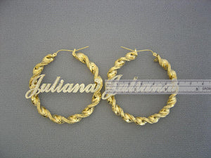 Close-up detail of 6mm two-tone twisted gold hoop and diamond accent custom nameplate