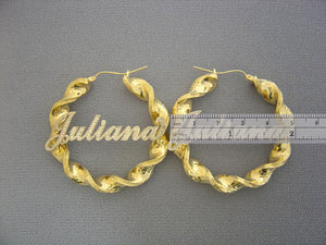 Close up of personalized script nameplate on 10K gold two-tone twisted hoop earring