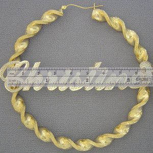 Hinged snap closure on extra large 3.5 inch 10K gold twisted hoop earrings