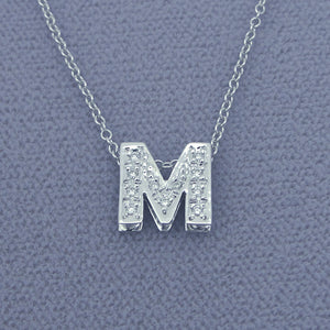 3D double plate initial pendant in solid gold set with genuine diamonds featuring letter M