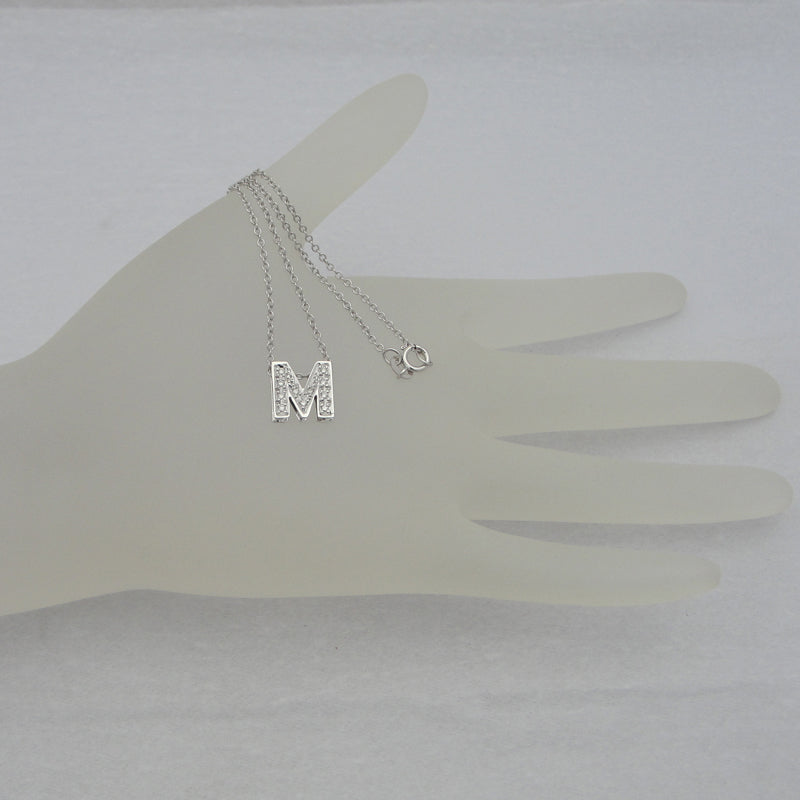 solid gold double plate diamond initial necklace for size reference