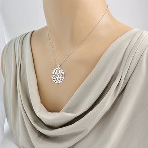 Personalized 14k white gold 3 initials monogram necklace worn on mannequin