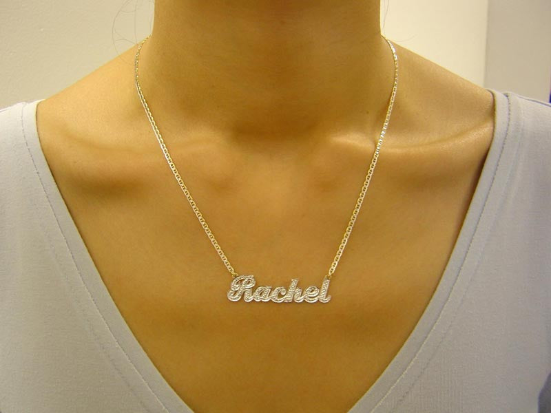 Gold &#39;Rachel&#39; necklace on a model