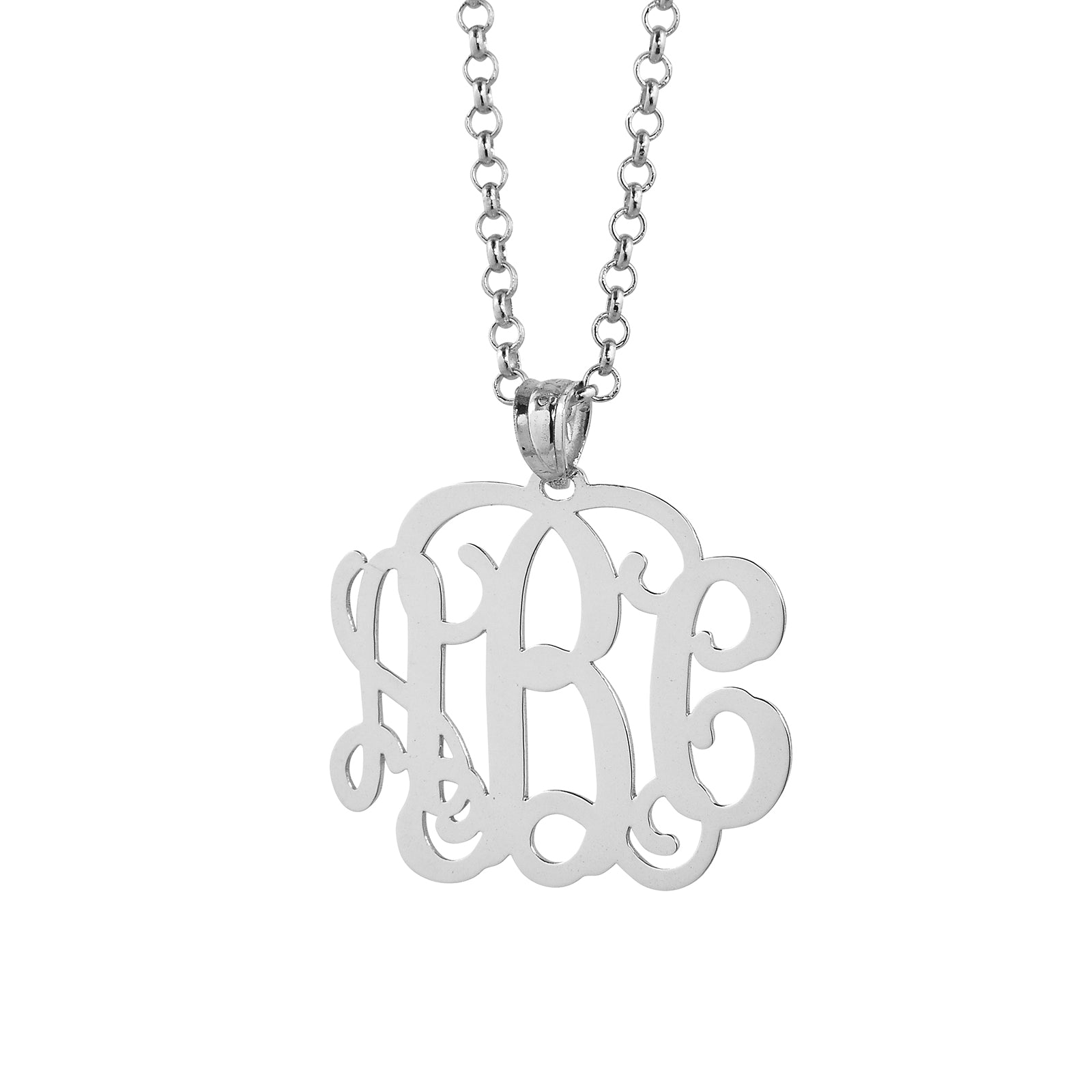 Close-up of laser-cut 925 sterling silver monogram pendant showing precise initials and bail detail