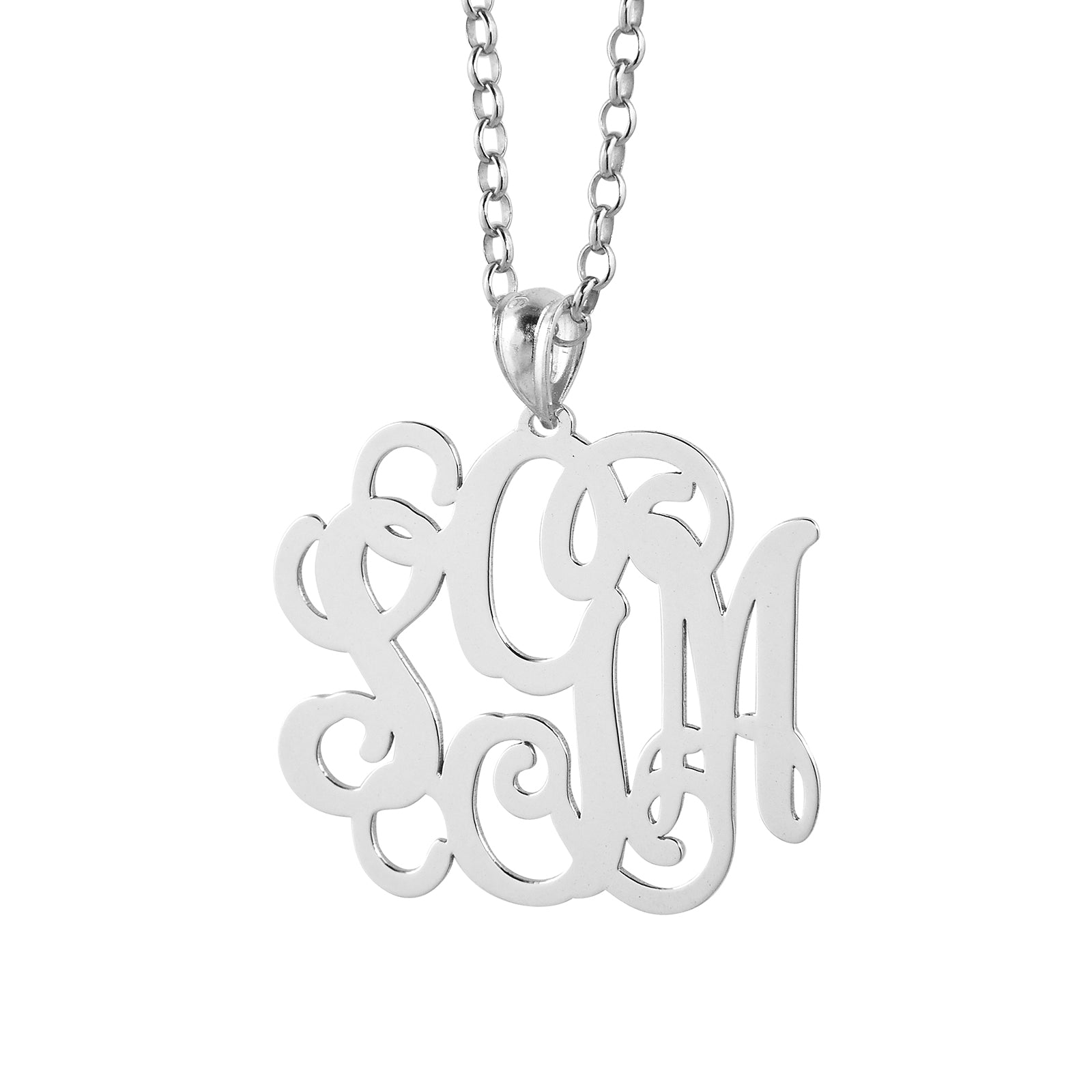Front view of custom-engraved 1.25-inch sterling silver monogram pendant showing laser-cut details.