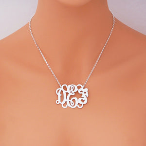 Woman wearing personalized 1.75 inch sterling silver 3-letter monogram necklace