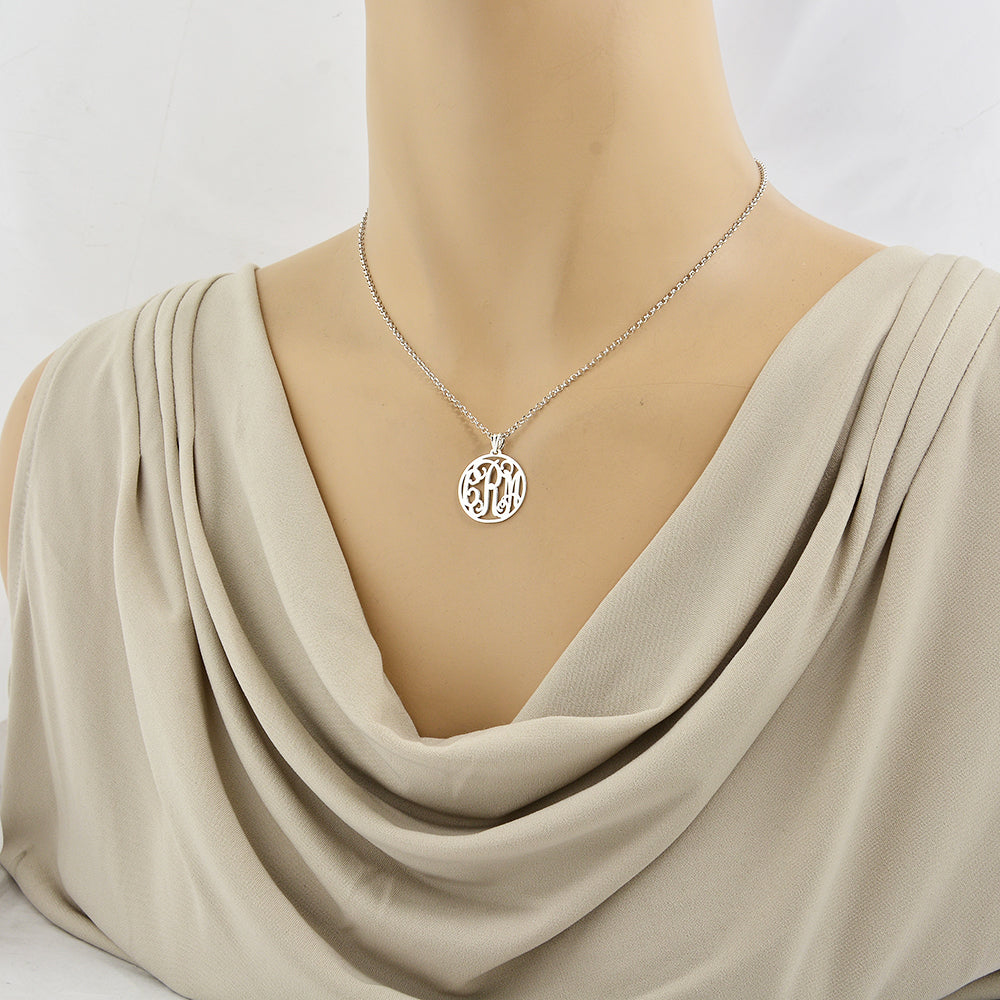 Model wearing custom 3-initial sterling silver circle monogram pendant necklace