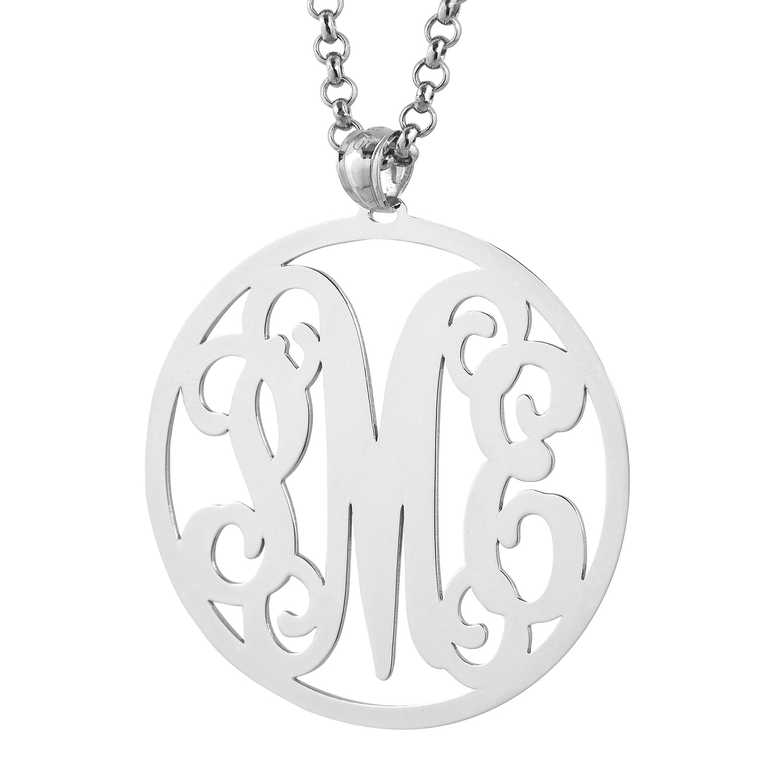 Detailed view of custom .925 sterling silver circle monogram pendant.